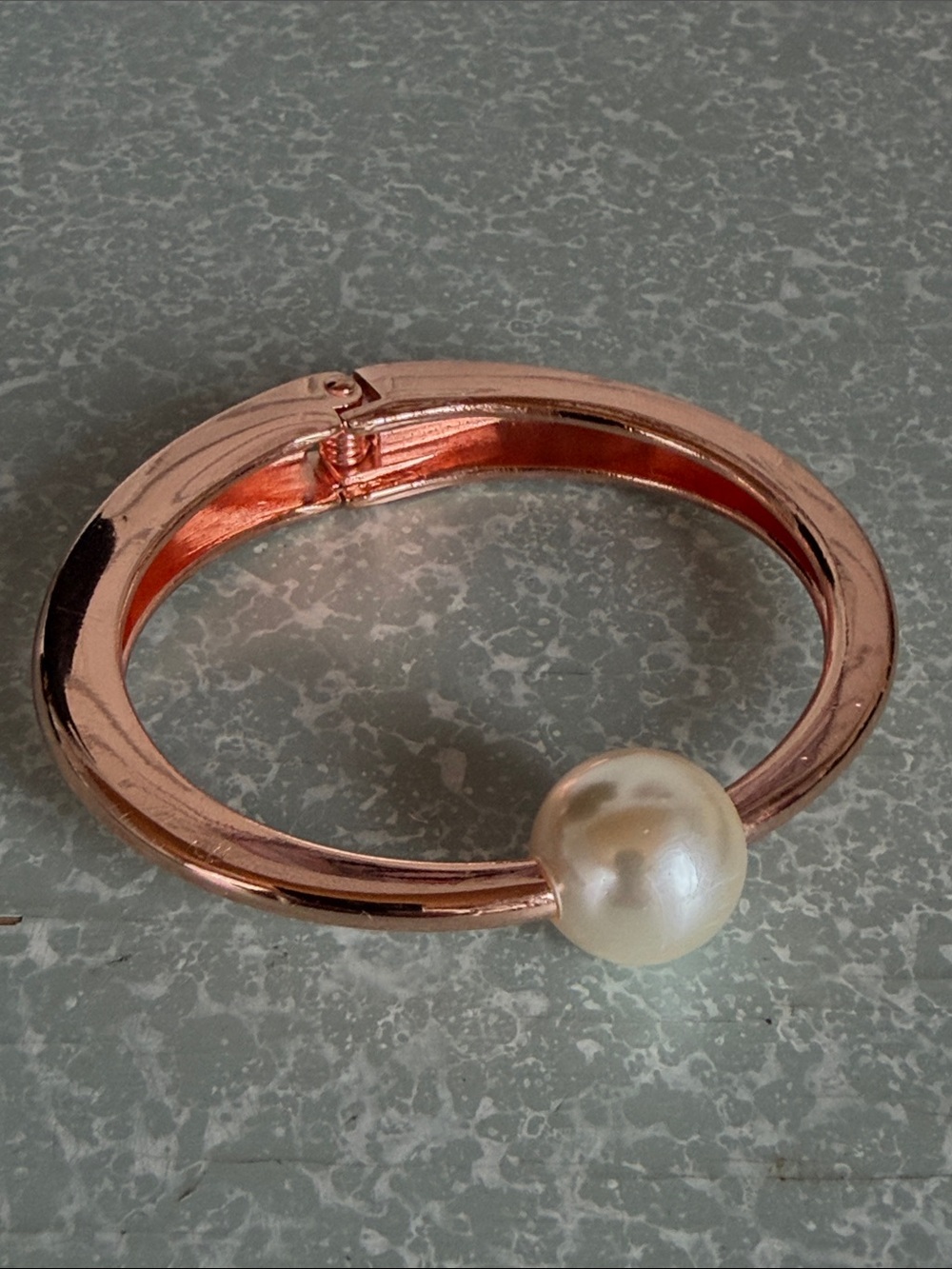 Minimalist copper tone pearl gumball hinged bangle